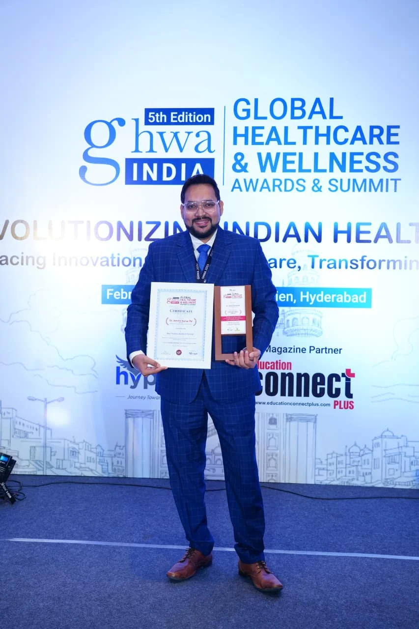Dr. Ashwin Kumar Pal with certificate and recognition plaque at the Global Healthcare and Wellness Awards and Summit