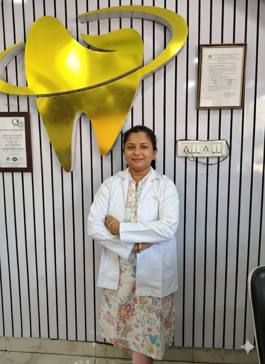Dr. Diksha Pal standing in front of the clinic logo