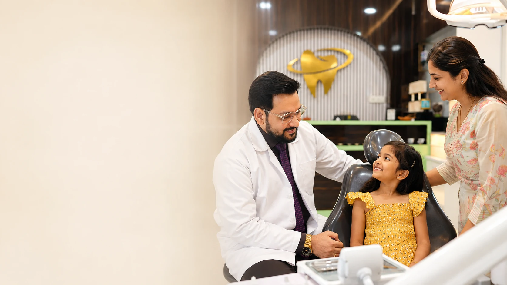 Dr. Ashwin Kumar Pal providing warm pediatric dental care to a child at the clinic